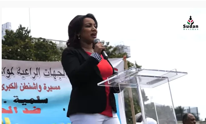 سالي العطا في كلمة تحفيزية عن حلمها في بناء سودان قوي قائم على العلم والعدل والمساواة. مسيرة السودانيين في واشنطن دي سي لدفع العنف والتتطرف وقتل الابرياء العزل في السودان.
